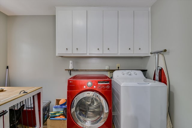 864 Chase Rd, Evans, GA 30809 - laundry room featuring washer and dryer and cabinet space
