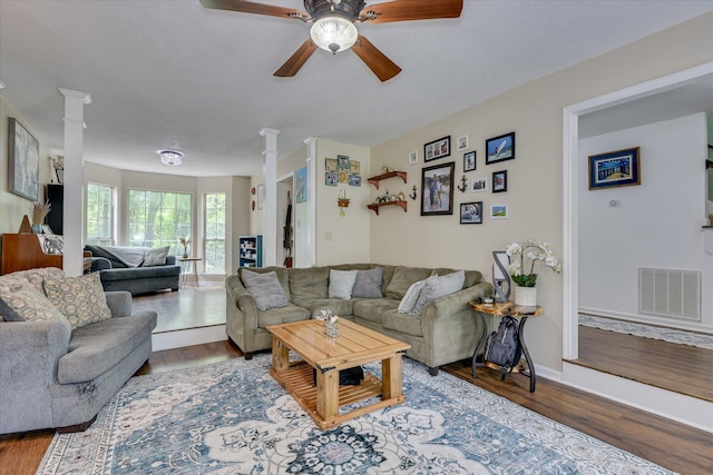 864 Chase Rd, Evans, GA 30809 - living area featuring decorative columns, a ceiling fan, wood finished floors, and baseboards