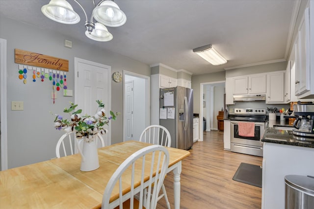 864 Chase Rd, Evans, GA 30809 - dining area with light wood-style floors and a chandelier