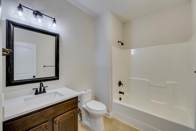 bathroom with bathing tub / shower combination, tile patterned flooring, vanity, and toilet