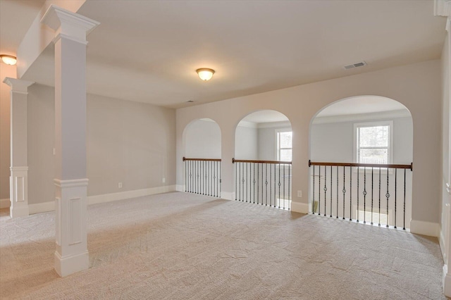 empty room featuring light colored carpet