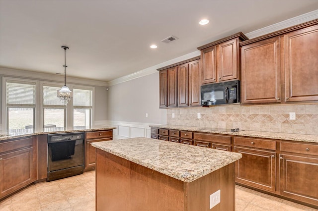 kitchen featuring a center island, decorative light fixtures, black appliances, ornamental molding, and decorative backsplash