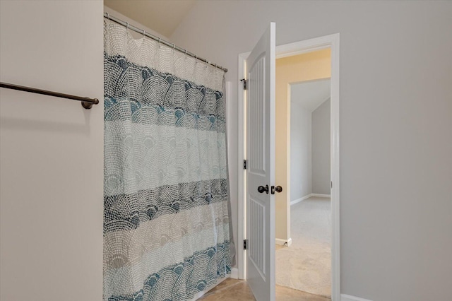 bathroom featuring walk in shower