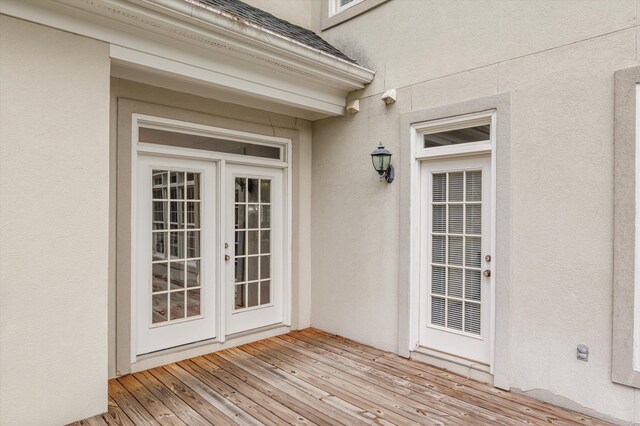 608 Saw Grass Dr, Martinez, GA 30907 - view of exterior entry with a wooden deck, stucco siding, and french doors