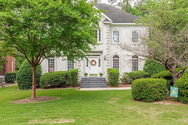 608 Saw Grass Dr, Martinez, GA 30907 - view of front of property featuring roof with shingles, stucco siding, and a front lawn