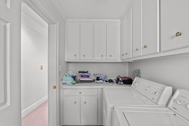 608 Saw Grass Dr, Martinez, GA 30907 - laundry room with baseboards, carpet flooring, crown molding, separate washer and dryer, and cabinet space