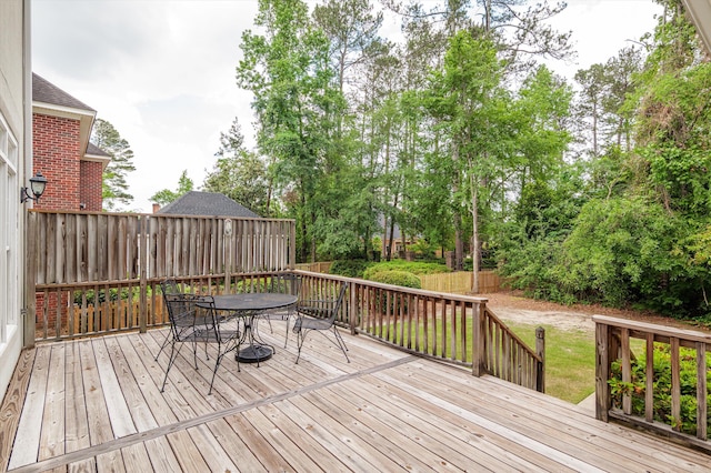 608 Saw Grass Dr, Martinez, GA 30907 - wooden deck featuring a fenced backyard and outdoor dining space