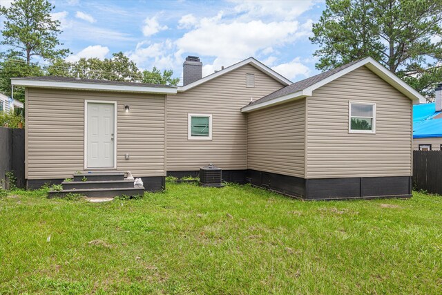 2156 Telfair St, Augusta, GA 30904 - rear view of house with central AC and a chimney
