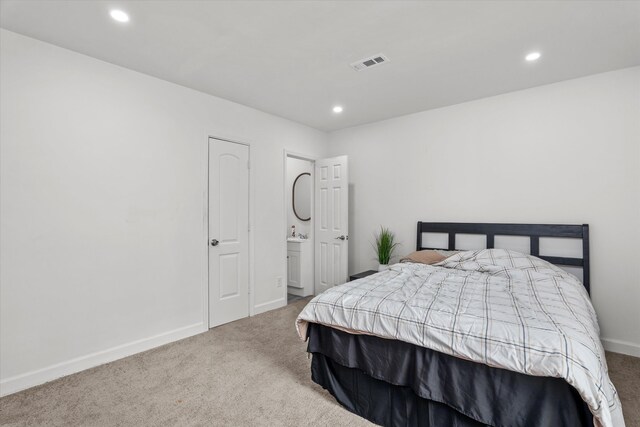 2156 Telfair St, Augusta, GA 30904 - bedroom with carpet flooring, recessed lighting, baseboards, and ensuite bathroom