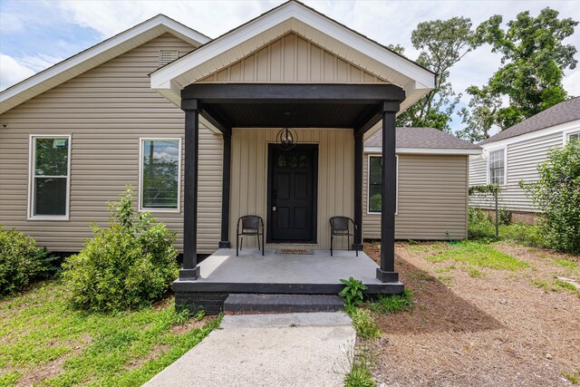 2156 Telfair St, Augusta, GA 30904 - property entrance featuring board and batten siding