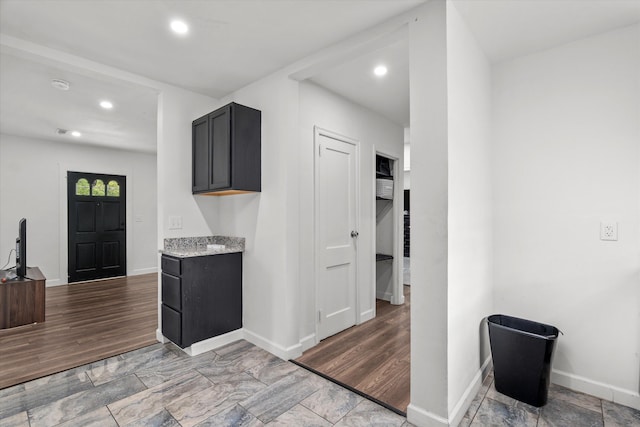2156 Telfair St, Augusta, GA 30904 - kitchen with baseboards, recessed lighting, and light stone counters