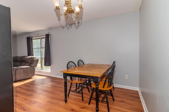 2383 Wheeless Rd, Augusta, GA 30906 - dining space featuring wood finished floors and a chandelier