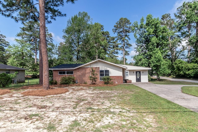 2383 Wheeless Rd, Augusta, GA 30906 - single story home with brick siding, driveway, and a front yard