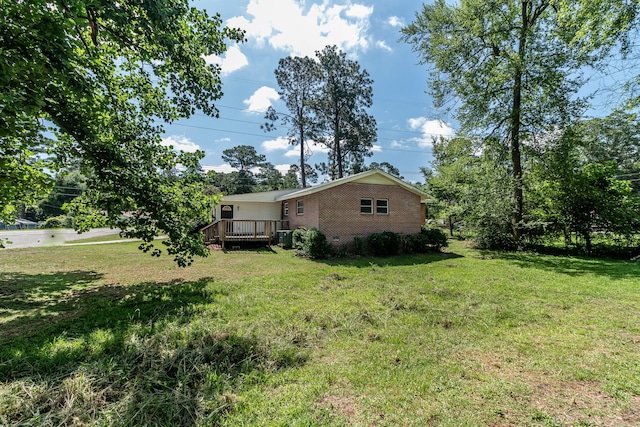 2383 Wheeless Rd, Augusta, GA 30906 - view of grassy yard featuring a deck