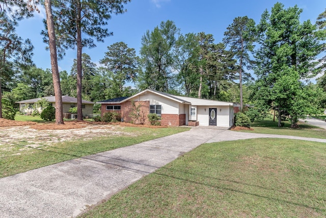 2383 Wheeless Rd, Augusta, GA 30906 - single story home with brick siding, concrete driveway, and a front lawn