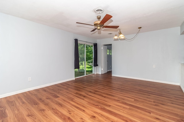 2383 Wheeless Rd, Augusta, GA 30906 - unfurnished room featuring ceiling fan, light wood-style floors, and a chandelier