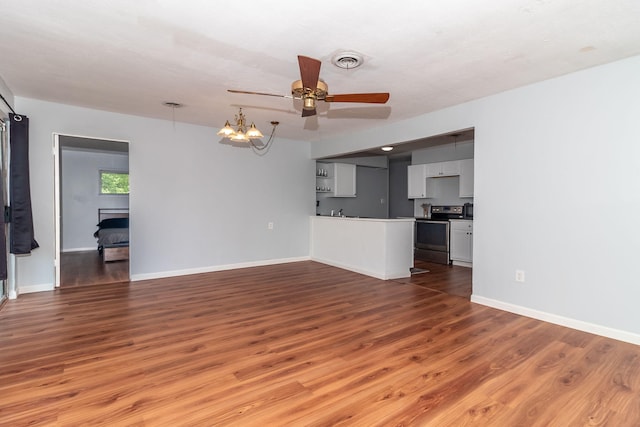 2383 Wheeless Rd, Augusta, GA 30906 - unfurnished living room featuring light wood-style floors, a chandelier, and a ceiling fan