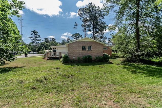 2383 Wheeless Rd, Augusta, GA 30906 - view of green lawn with a deck