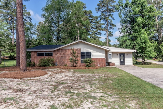2383 Wheeless Rd, Augusta, GA 30906 - ranch-style home featuring brick siding and a front lawn