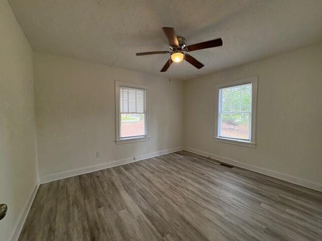 2315 Ridge Rd, Augusta, GA 30906 - unfurnished room featuring wood finished floors, ceiling fan, and a textured ceiling
