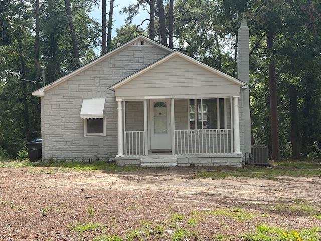 2315 Ridge Rd, Augusta, GA 30906 - bungalow featuring covered porch, a chimney, and stone siding