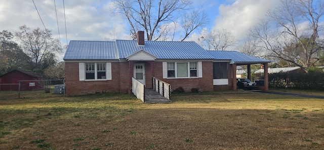 view of front of home with a front yard