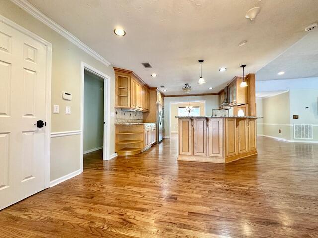 3129 Goolsby Rd, Blythe, GA 30805 - kitchen with freestanding refrigerator, open shelves, wood finished floors, baseboards, and recessed lighting