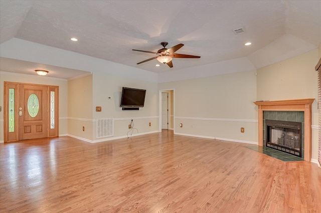 3129 Goolsby Rd, Blythe, GA 30805 - unfurnished living room with a ceiling fan, light wood-style floors, a fireplace, recessed lighting, and vaulted ceiling
