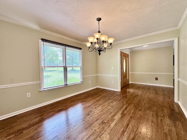 3129 Goolsby Rd, Blythe, GA 30805 - unfurnished room with a chandelier, wood finished floors, a textured ceiling, ornamental molding, and baseboards