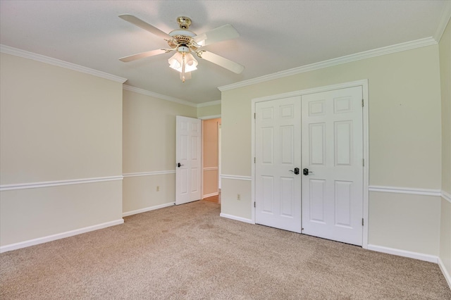 3129 Goolsby Rd, Blythe, GA 30805 - unfurnished bedroom featuring carpet floors, ornamental molding, a closet, and a ceiling fan