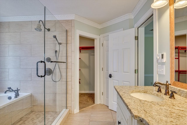 3129 Goolsby Rd, Blythe, GA 30805 - full bathroom featuring a walk in closet, a stall shower, vanity, crown molding, and tile patterned floors