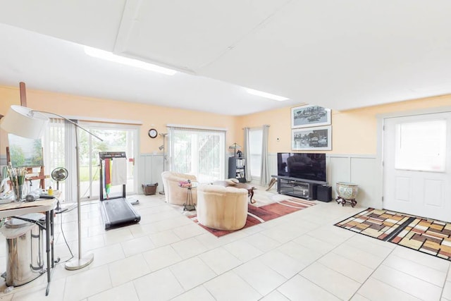114 Altamaha Dr, North Augusta, SC 29841 - living area featuring a wainscoted wall, a decorative wall, and light tile patterned floors