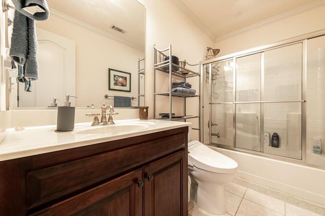 114 Altamaha Dr, North Augusta, SC 29841 - full bathroom with crown molding, tile patterned floors, vanity, toilet, and combined bath / shower with glass door