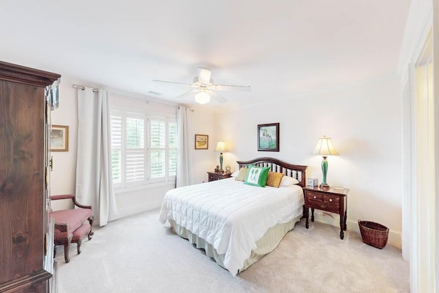 114 Altamaha Dr, North Augusta, SC 29841 - bedroom featuring light colored carpet, ceiling fan, baseboards, and ornamental molding
