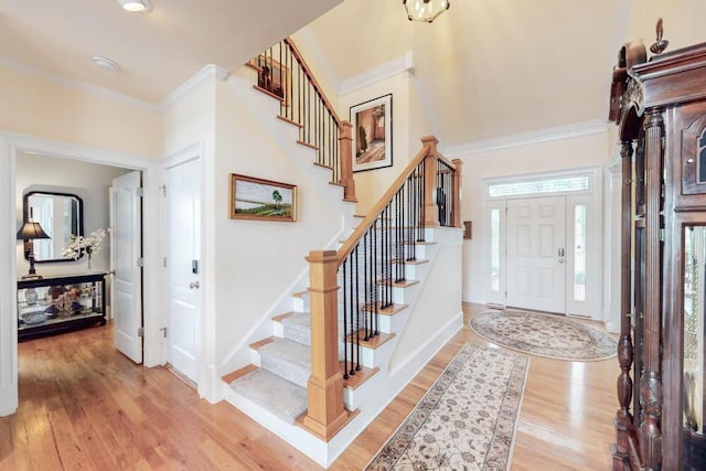114 Altamaha Dr, North Augusta, SC 29841 - foyer featuring stairway, ornamental molding, light wood-style flooring, and baseboards