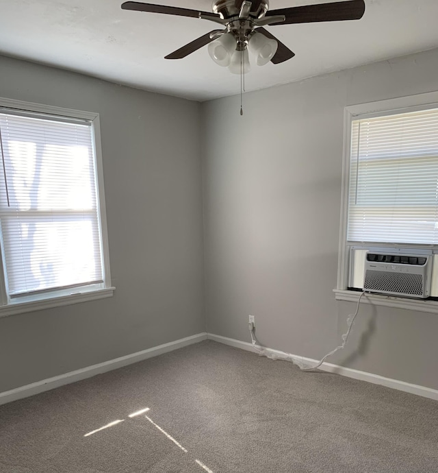 unfurnished room with carpet, cooling unit, and ceiling fan