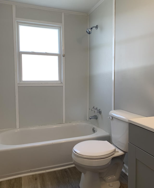 full bathroom featuring vanity, wood-type flooring, toilet, and washtub / shower combination