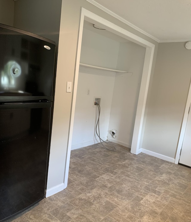 laundry room with crown molding