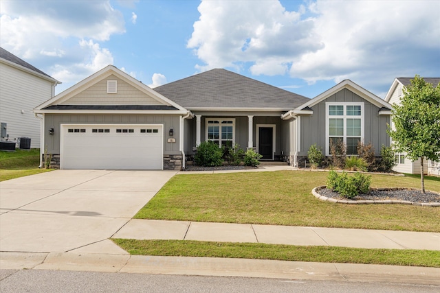 751 Bancroft Dr, Grovetown, GA 30813 - craftsman house with board and batten siding, a garage, concrete driveway, and a front yard