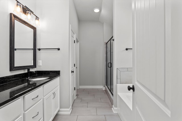751 Bancroft Dr, Grovetown, GA 30813 - bathroom with vanity, a garden tub, a stall shower, tile patterned floors, and recessed lighting