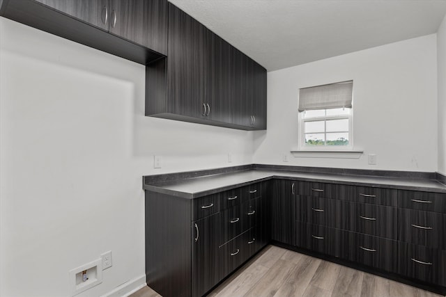 751 Bancroft Dr, Grovetown, GA 30813 - kitchen featuring dark countertops, light wood-style floors, and modern cabinets