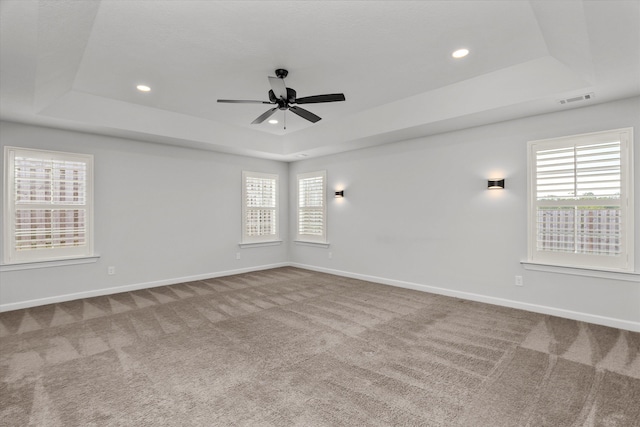 751 Bancroft Dr, Grovetown, GA 30813 - carpeted empty room with a raised ceiling, a ceiling fan, plenty of natural light, and recessed lighting