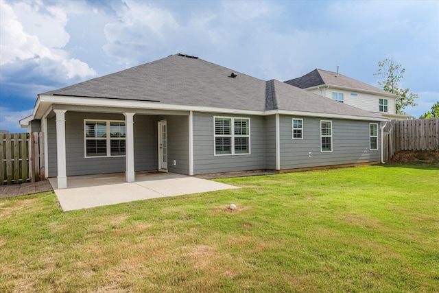 751 Bancroft Dr, Grovetown, GA 30813 - rear view of house with roof with shingles and a patio