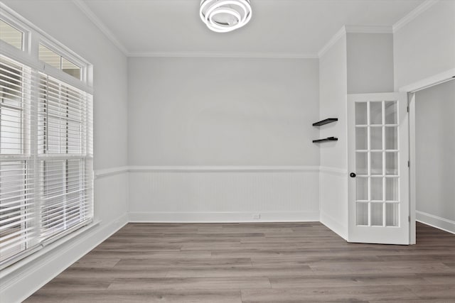 751 Bancroft Dr, Grovetown, GA 30813 - unfurnished room featuring crown molding, wood finished floors, french doors, and wainscoting