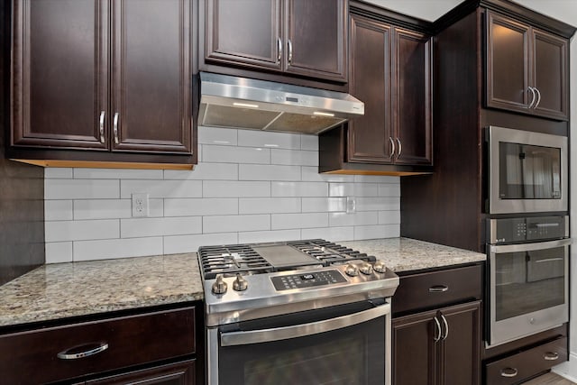 751 Bancroft Dr, Grovetown, GA 30813 - kitchen with stainless steel appliances, under cabinet range hood, and dark brown cabinets