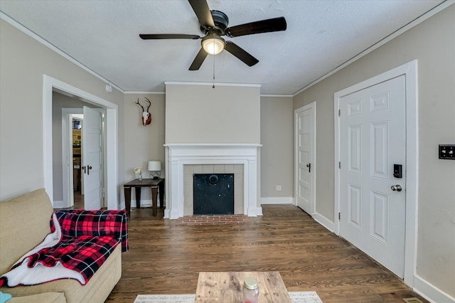 501 Beaufort Dr, Augusta, GA 30904 - living room featuring ornamental molding, ceiling fan, a tile fireplace, and wood finished floors