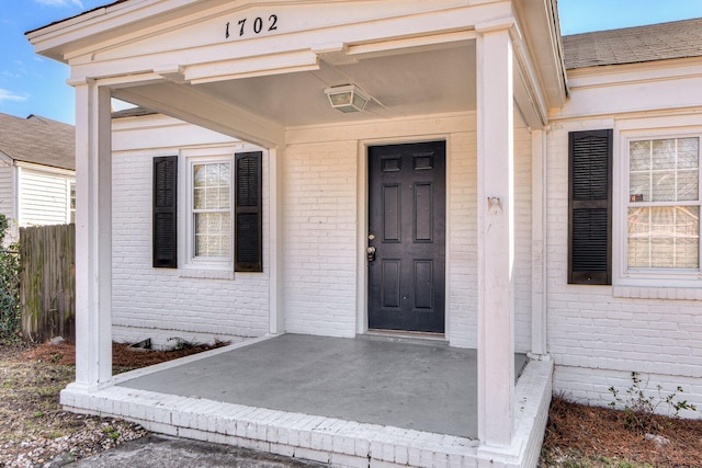 doorway to property with a patio