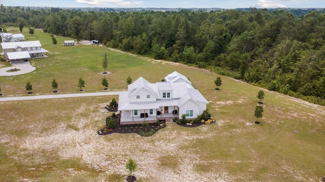 1513 Paris Ave, Swainsboro, GA 30401 - view from above of property with a heavily wooded area