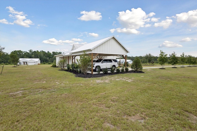 1513 Paris Ave, Swainsboro, GA 30401 - view of grassy yard featuring an attached carport