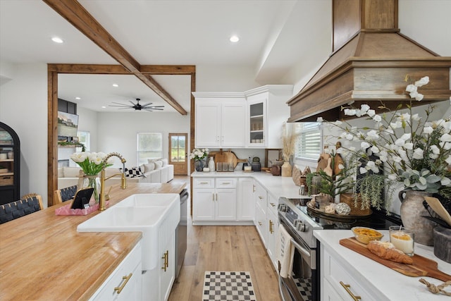 1513 Paris Ave, Swainsboro, GA 30401 - kitchen featuring stainless steel appliances, plenty of natural light, light wood finished floors, recessed lighting, and ceiling fan
